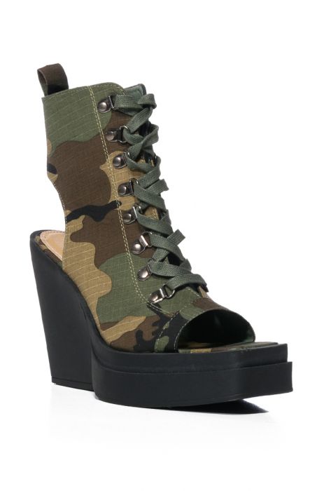 OFF DUTY PEEP TOE PLATFORM BOOTIE IN CAMO