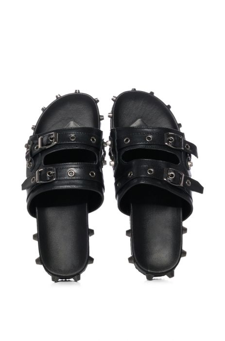 CHAOTIC STUDDED FLAT SANDAL IN BLACK