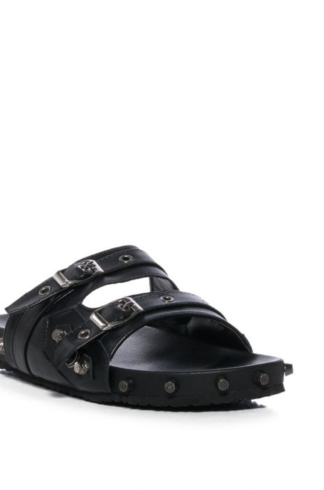 CHAOTIC STUDDED FLAT SANDAL IN BLACK