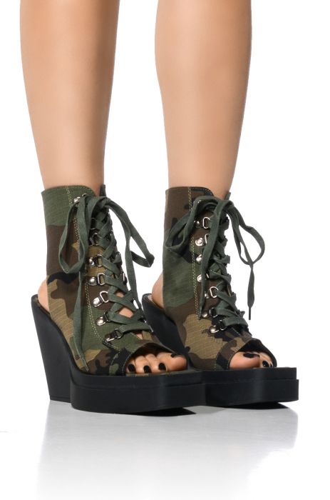 OFF DUTY PEEP TOE PLATFORM BOOTIE IN CAMO