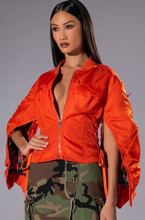 YOUR MOVE FITTED CORSET BOMBER WITH ADJUSTABLE SIDE LACE UP DETAILING IN ORANGE